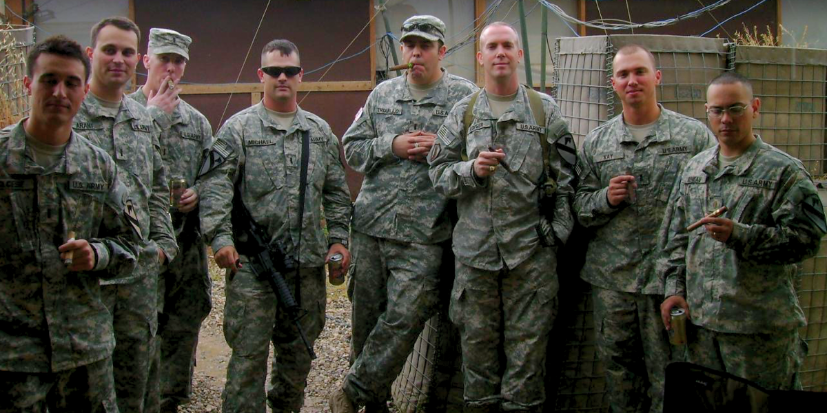 Joseph Kopser with fellow soldiers during his 20-year Army career